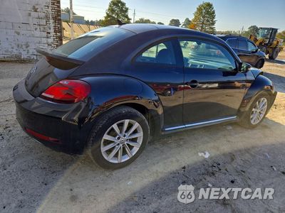 Trzecie zdjęcie samochodu z tyłu: 2017 VOLKSWAGEN BEETLE SE VIN:3VWJ17AT7HM610096 - miniatura