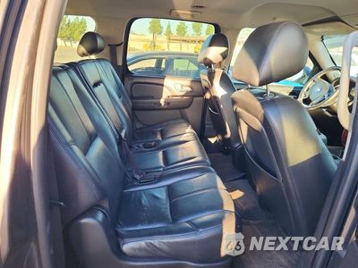 Zdjęcie 11 z 13 samochodu: 2010 CHEVROLET SUBURBAN C1500 LT VIN:1GNUCJE09AR216439 - miniatura