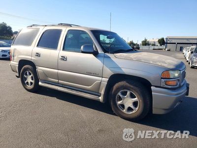 Czwarte zdjęcie samochodu z boku: 2001 GMC DENALI VIN:1GKEK63U41J263609 - miniatura