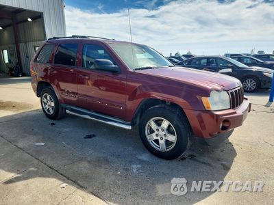 Czwarte zdjęcie samochodu z boku: 2007 JEEP GRAND CHEROKEE LAREDO VIN:1J8HS48P47C699320 - miniatura