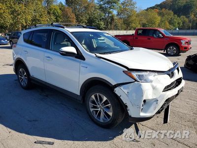 Czwarte zdjęcie samochodu z boku: 2018 TOYOTA RAV4 HYBRID XLE VIN:JTMRJREV4JD185001 - miniatura