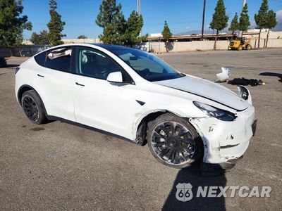 Czwarte zdjęcie samochodu z boku: 2021 TESLA MODEL Y VIN:5YJYGDEE1MF070866 - miniatura