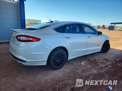 Trzecie zdjęcie samochodu z tyłu: 2016 FORD FUSION TITANIUM PHEV VIN:3FA6P0SU6GR291612 - miniatura