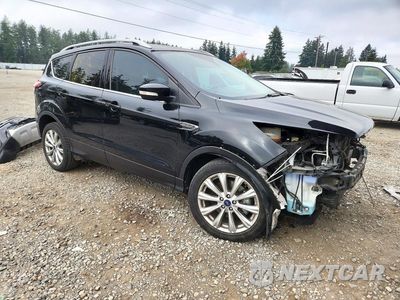 Czwarte zdjęcie samochodu z boku: 2017 FORD ESCAPE TITANIUM VIN:1FMCU0J9XHUD95786 - miniatura