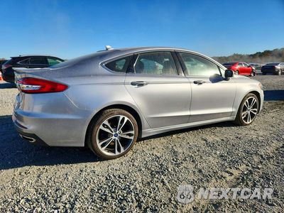 Trzecie zdjęcie samochodu z tyłu: 2020 FORD FUSION TITANIUM VIN:3FA6P0D98LR151578 - miniatura