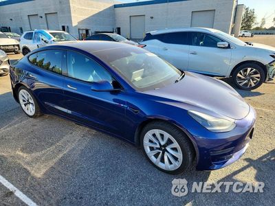 Czwarte zdjęcie samochodu z boku: 2022 TESLA MODEL 3 VIN:5YJ3E1EB4NF142567 - miniatura