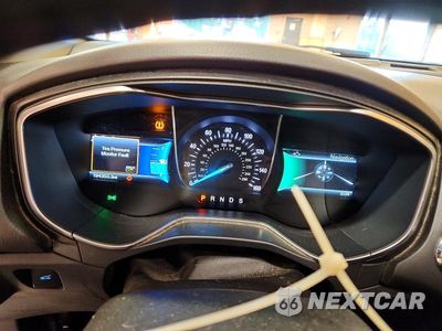 Zdjęcie 9 z 12 samochodu: 2017 FORD FUSION TITANIUM VIN:3FA6P0D94HR211007 - miniatura