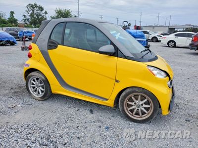 Czwarte zdjęcie samochodu z boku: 2016 SMART FORTWO VIN:WMEEJ9AA4GK845285 - miniatura