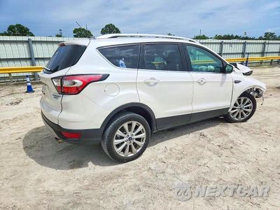 Trzecie zdjęcie samochodu z tyłu: 2017 FORD ESCAPE TITANIUM VIN:1FMCU0JD8HUB7423X - miniatura