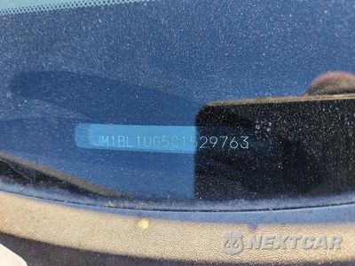 Zdjęcie 12 z 12 samochodu: 2012 MAZDA 3 I VIN:JM1BL1UG5C1529763 - miniatura