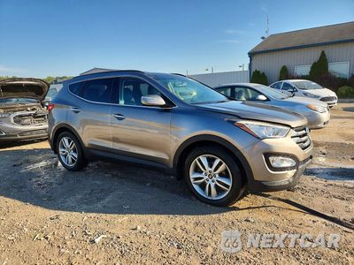 Czwarte zdjęcie samochodu z boku: 2015 HYUNDAI SANTA FE SPORT 2.0T VIN:5XYZWDLA1FG263201 - miniatura