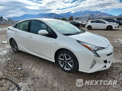Czwarte zdjęcie samochodu z boku: 2017 TOYOTA PRIUS FOUR TOURING VIN:JTDKARFU7H3036251 - miniatura