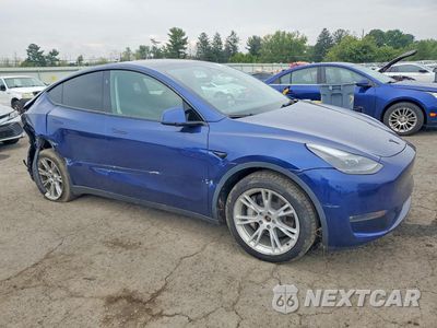 Czwarte zdjęcie samochodu z boku: 2023 TESLA MODEL Y VIN:7SAYGDEE8PF802997 - miniatura