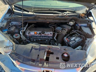 Zdjęcie 12 z 13 samochodu: 2010 HONDA CR-V EXL VIN:JHLRE4H75AC013184 - miniatura