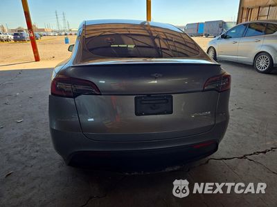Zdjęcie 6 z 12 samochodu: 2024 TESLA MODEL Y VIN:7SAYGDEF5RF161965 - miniatura