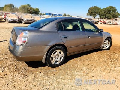 Trzecie zdjęcie samochodu z tyłu: 2003 NISSAN ALTIMA 2.5 S VIN:1N4AL11E43C321625 - miniatura