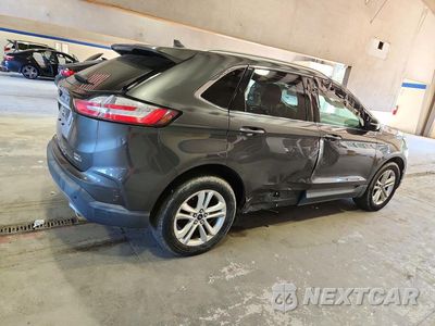 Trzecie zdjęcie samochodu z tyłu: 2019 FORD EDGE SEL VIN:2FMPK4J94KBC64171 - miniatura