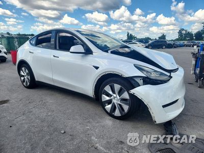 Czwarte zdjęcie samochodu z boku: 2021 TESLA MODEL Y VIN:5YJYGDEE1MF265723 - miniatura