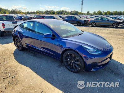 Czwarte zdjęcie samochodu z boku: 2018 TESLA MODEL 3 VIN:5YJ3E1EB7JF054767 - miniatura