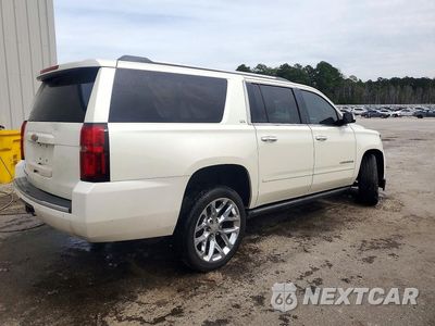 Trzecie zdjęcie samochodu z tyłu: 2015 CHEVROLET SUBURBAN C1500 LTZ VIN:1GNSCKKC9FR145066 - miniatura