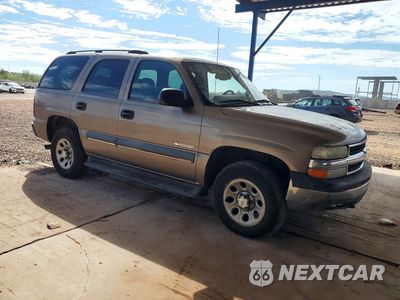 Czwarte zdjęcie samochodu z boku: 2003 CHEVROLET TAHOE C1500 VIN:1GNEC13Z03R255140 - miniatura