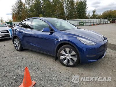 Czwarte zdjęcie samochodu z boku: 2022 TESLA MODEL Y VIN:7SAYGAEE9NF506401 - miniatura