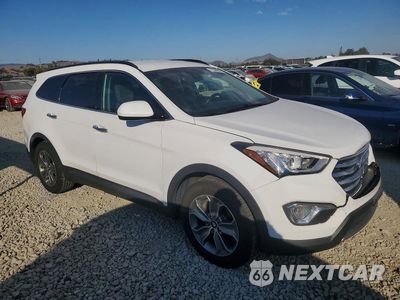 Czwarte zdjęcie samochodu z boku: 2016 HYUNDAI SANTA FE SE VIN:KM8SM4HF2GU144385 - miniatura