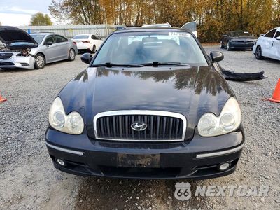 Piąte zdjęcie samochodu w środku: 2003 HYUNDAI SONATA GLS VIN:KMHWF35H03A816399 - miniatura