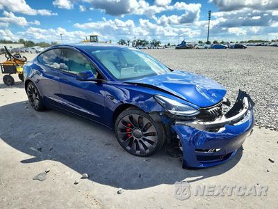 Czwarte zdjęcie samochodu z boku: 2021 TESLA MODEL 3 VIN:5YJ3E1EC8MF013416 - miniatura