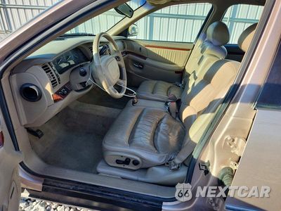 Zdjęcie 7 z 12 samochodu: 1999 BUICK PARK AVENUE ULTRA VIN:1G4CU5219X4619988 - miniatura