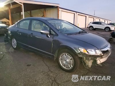 Czwarte zdjęcie samochodu z boku: 2011 HONDA CIVIC HYBRID VIN:JHMFA3F25BS000292 - miniatura