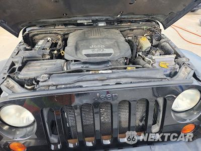 Zdjęcie 12 z 13 samochodu: 2013 JEEP WRANGLER UNLIMITED SAHARA VIN:1C4HJWEG5DL580603 - miniatura