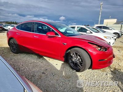 Czwarte zdjęcie samochodu z boku: 2018 TESLA MODEL 3 VIN:5YJ3E1EB5JF114805 - miniatura