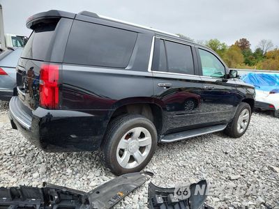 Trzecie zdjęcie samochodu z tyłu: 2018 CHEVROLET TAHOE K1500 PREMIER VIN:1GNSKCKC7JR402114 - miniatura