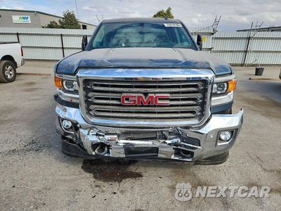 Piąte zdjęcie samochodu w środku: 2015 GMC SIERRA K2500 SLT VIN:1GT12ZE88FF123018 - miniatura