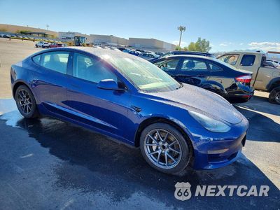 Czwarte zdjęcie samochodu z boku: 2022 TESLA MODEL 3 VIN:5YJ3E1EA7NF289263 - miniatura