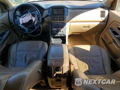 Zdjęcie 8 z 14 samochodu: 2005 HONDA PILOT EXL VIN:2HKYF18785H570539 - miniatura