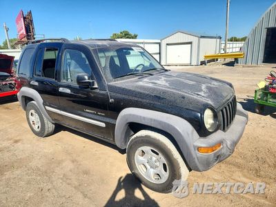 Czwarte zdjęcie samochodu z boku: 2002 JEEP LIBERTY SPORT VIN:1J4GL48K62W136730 - miniatura