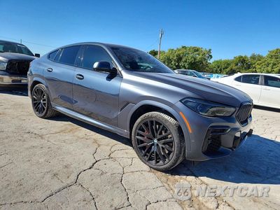 Czwarte zdjęcie samochodu z boku: 2022 BMW X6 M50I VIN:5UXCY8C09N9L68372 - miniatura