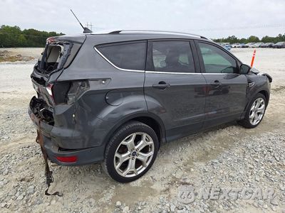 Trzecie zdjęcie samochodu z tyłu: 2019 FORD ESCAPE TITANIUM VIN:1FMCU0J91KUC19541 - miniatura