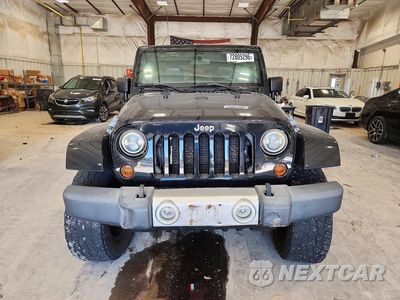 Piąte zdjęcie samochodu w środku: 2012 JEEP WRANGLER UNLIMITED SAHARA VIN:1C4HJWEG4CL240891 - miniatura