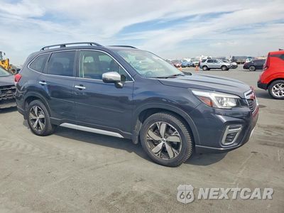 Czwarte zdjęcie samochodu z boku: 2019 SUBARU FORESTER TOURING VIN:JF2SKAWC2KH452533 - miniatura
