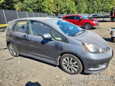 Czwarte zdjęcie samochodu z boku: 2013 HONDA FIT SPORT VIN:JHMGE8H57DC030307 - miniatura
