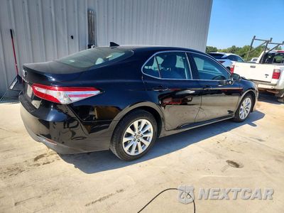 Trzecie zdjęcie samochodu z tyłu: 2020 TOYOTA CAMRY LE VIN:4T1C11AK5LU968264 - miniatura
