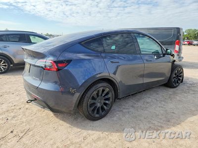 Trzecie zdjęcie samochodu z tyłu: 2023 TESLA MODEL Y VIN:7SAYGDEE1PA031232 - miniatura