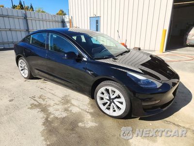 Czwarte zdjęcie samochodu z boku: 2022 TESLA MODEL 3 VIN:5YJ3E1EA1NF291302 - miniatura