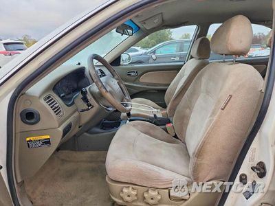 Zdjęcie 7 z 12 samochodu: 2004 HYUNDAI SONATA BASE VIN:KMHWF25S04A090941 - miniatura