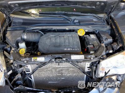 Zdjęcie 12 z 13 samochodu: 2013 DODGE GRAND CARAVAN SXT VIN:2C4RDGCG0DR738700 - miniatura