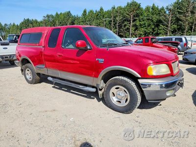 Czwarte zdjęcie samochodu z boku: 2003 FORD F150 VIN:2FTRX08L23CA40417 - miniatura