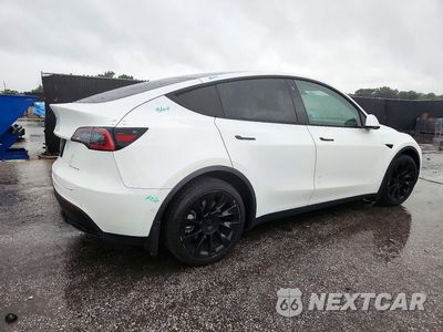 Trzecie zdjęcie samochodu z tyłu: 2021 TESLA MODEL Y VIN:5YJYGDEE4MF186983 - miniatura